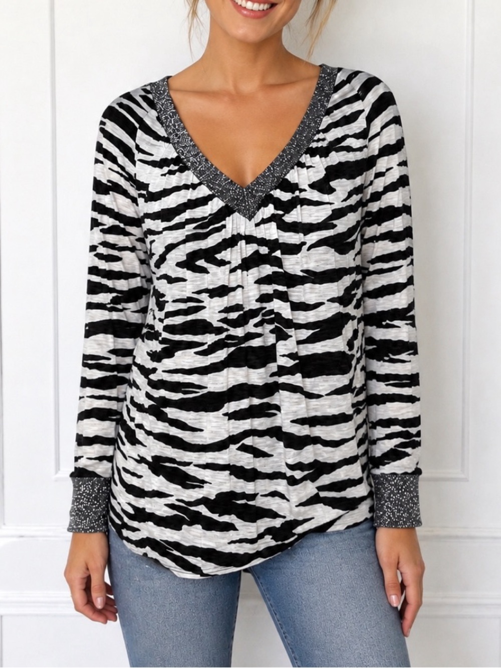 Daytrip black and white zebra print long-sleeved women's blouse with a V-neck